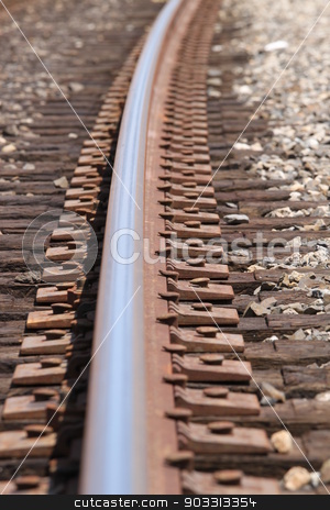 To use this stock image in your creative project, please select the size you need over to the right and click the "Add to Cart" button.
Your downloaded image will come with the Cutcaster watermark removed so don’t worry about the watermark you see on this page. Train Track stock photo, One single train track in gravel with a curve. by Henrik Lehnerer