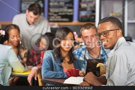 To use this stock image in your creative project, please select the size you need over to the right and click the "Add to Cart" button.
Your downloaded image will come with the Cutcaster watermark removed so don’t worry about the watermark you see on this page. Handsome Man with Friends stock photo, Handsome young African man with friends in cafe by Scott Griessel