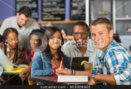 To use this stock image in your creative project, please select the size you need over to the right and click the "Add to Cart" button.
Your downloaded image will come with the Cutcaster watermark removed so don’t worry about the watermark you see on this page. Happy Student with Friends stock photo, Handsome Caucasian student doing homework with friends by Scott Griessel