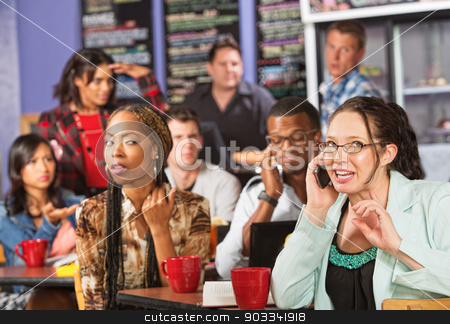 To use this stock image in your creative project, please select the size you need over to the right and click the "Add to Cart" button.
Your downloaded image will come with the Cutcaster watermark removed so don’t worry about the watermark you see on this page. Rude Woman on Phone in Cafe stock photo, Annoyed students watching loud woman on cell phone by Scott Griessel