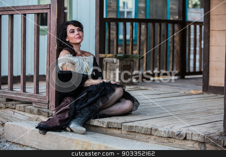 To use this stock image in your creative project, please select the size you need over to the right and click the "Add to Cart" button.
Your downloaded image will come with the Cutcaster watermark removed so don’t worry about the watermark you see on this page. Saloon Girl Portrait stock photo, Portrait of an old west saloon girl by Scott Griessel