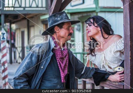 To use this stock image in your creative project, please select the size you need over to the right and click the "Add to Cart" button.
Your downloaded image will come with the Cutcaster watermark removed so don’t worry about the watermark you see on this page. Gruff Man and Woman stock photo, Portrait of an old west woman and sheriff by Scott Griessel