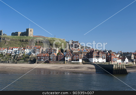 To use this stock image in your creative project, please select the size you need over to the right and click the "Add to Cart" button.
Your downloaded image will come with the Cutcaster watermark removed so don’t worry about the watermark you see on this page. St Mary's Church, Tate Hill, Whitby stock photo, St Mary's Church, Tate Hill, Whitby overlooking the harbour and entrance to the river is a historical medieval landmark where Bram Stokers film on Dracula was filmed by Stephen Gibson