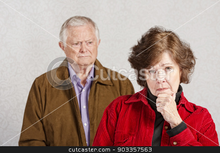 To use this stock image in your creative project, please select the size you need over to the right and click the "Add to Cart" button.
Your downloaded image will come with the Cutcaster watermark removed so don’t worry about the watermark you see on this page. Serious Senior Woman stock photo, Serious woman with hand on chin with man watching by Scott Griessel
