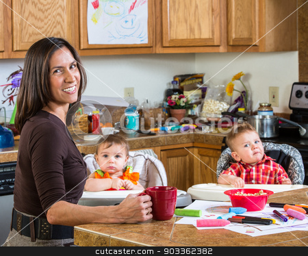 To use this stock image in your creative project, please select the size you need over to the right and click the "Add to Cart" button.
Your downloaded image will come with the Cutcaster watermark removed so don’t worry about the watermark you see on this page. Mother Smiles With Babies stock photo, Smiling mother poses with her babies by Scott Griessel