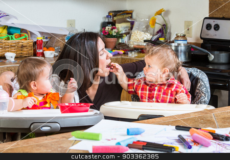 To use this stock image in your creative project, please select the size you need over to the right and click the "Add to Cart" button.
Your downloaded image will come with the Cutcaster watermark removed so don’t worry about the watermark you see on this page. Baby Feeds Mother stock photo, Baby feeds his mother cereal at breakfast by Scott Griessel