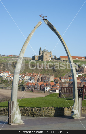To use this stock image in your creative project, please select the size you need over to the right and click the "Add to Cart" button.
Your downloaded image will come with the Cutcaster watermark removed so don’t worry about the watermark you see on this page. Whalebone arch in Whitby, North Yorkshire stock photo, Whalebone arch in Whitby, North Yorkshire, constructed from two jaw bones to commemorate whaling in the region framing the ruins of Whitby Abbey on Tate Hill by Stephen Gibson