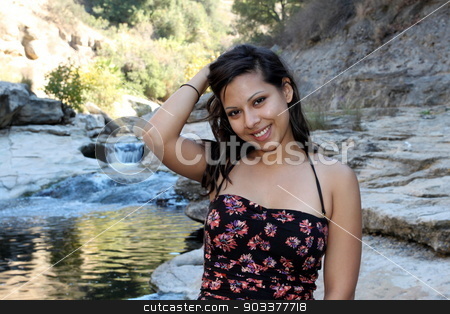 To use this stock image in your creative project, please select the size you need over to the right and click the "Add to Cart" button.
Your downloaded image will come with the Cutcaster watermark removed so don’t worry about the watermark you see on this page. Young Hispanic Woman stock photo, Young Hispanic woman near a creek. by Henrik Lehnerer