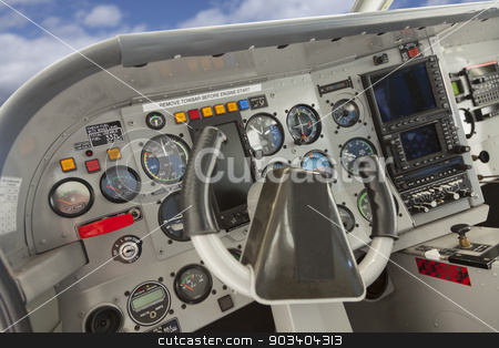 To use this stock image in your creative project, please select the size you need over to the right and click the "Add to Cart" button.
Your downloaded image will come with the Cutcaster watermark removed so don’t worry about the watermark you see on this page. Cockpit of a Cessna Airplane. stock photo, Detailed Cockpit of a Cessna Airplane. by Andy Dean