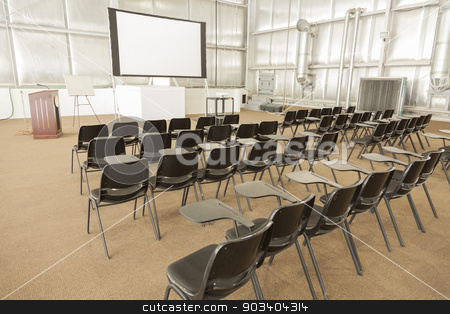 To use this stock image in your creative project, please select the size you need over to the right and click the "Add to Cart" button.
Your downloaded image will come with the Cutcaster watermark removed so don’t worry about the watermark you see on this page. Empty Presentation Conference Room stock photo, Empty Presentation Conference Room with Desk Chairs and Projector Screen. by Andy Dean