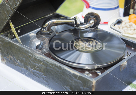 To use this stock image in your creative project, please select the size you need over to the right and click the "Add to Cart" button.
Your downloaded image will come with the Cutcaster watermark removed so don’t worry about the watermark you see on this page. Antique Phonograph Record Player stock photo, Antique Phonograph Record Player on Table. by Andy Dean