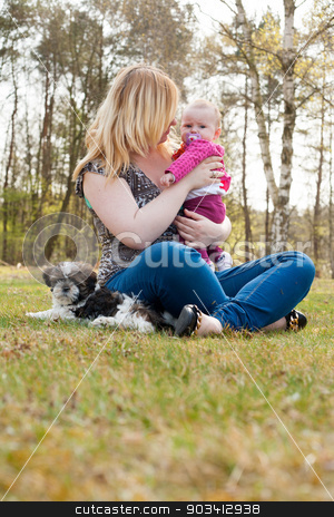 To use this stock image in your creative project, please select the size you need over to the right and click the "Add to Cart" button.
Your downloaded image will come with the Cutcaster watermark removed so don’t worry about the watermark you see on this page. Mother and her little girl stock photo, Mother is having a trip with the baby and dog outside by Frenk and Danielle Kaufmann