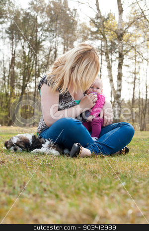 To use this stock image in your creative project, please select the size you need over to the right and click the "Add to Cart" button.
Your downloaded image will come with the Cutcaster watermark removed so don’t worry about the watermark you see on this page. unrecognizable mother stock photo, Mother is having a trip with the baby and dog outside by Frenk and Danielle Kaufmann