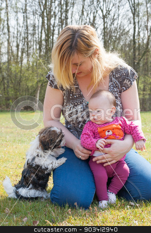 To use this stock image in your creative project, please select the size you need over to the right and click the "Add to Cart" button.
Your downloaded image will come with the Cutcaster watermark removed so don’t worry about the watermark you see on this page. Mother her baby and puppy stock photo, Mother is having a trip with the baby and dog outside by Frenk and Danielle Kaufmann