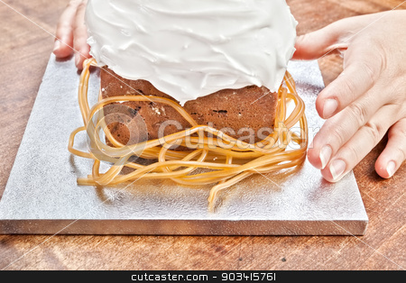 To use this stock image in your creative project, please select the size you need over to the right and click the "Add to Cart" button.
Your downloaded image will come with the Cutcaster watermark removed so don’t worry about the watermark you see on this page. Hands decorating christmas cake stock photo, Christmas creamy cake decorated by hands
by Dario Rota