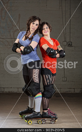To use this stock image in your creative project, please select the size you need over to the right and click the "Add to Cart" button.
Your downloaded image will come with the Cutcaster watermark removed so don’t worry about the watermark you see on this page. Confident Roller Derby Skaters stock photo, Pair of confident female roller skaters derby standing by Scott Griessel
