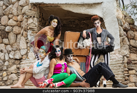 To use this stock image in your creative project, please select the size you need over to the right and click the "Add to Cart" button.
Your downloaded image will come with the Cutcaster watermark removed so don’t worry about the watermark you see on this page. Serious Bizarre Clowns on Stage stock photo, Group of serious bizarre clowns on outdoor stage by Scott Griessel