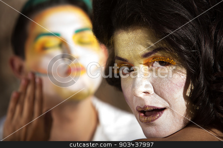 To use this stock image in your creative project, please select the size you need over to the right and click the "Add to Cart" button.
Your downloaded image will come with the Cutcaster watermark removed so don’t worry about the watermark you see on this page. Modest Clown Dismissing Admirerer stock photo, Modest young woman as clown rejecting kissing man by Scott Griessel
