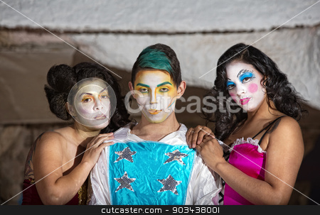 To use this stock image in your creative project, please select the size you need over to the right and click the "Add to Cart" button.
Your downloaded image will come with the Cutcaster watermark removed so don’t worry about the watermark you see on this page. Grinning Cirque Clown with Admirers stock photo, Grinning cute cirque performer with female admirers by Scott Griessel