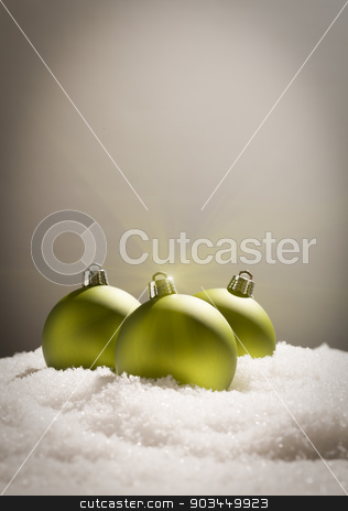To use this stock image in your creative project, please select the size you need over to the right and click the "Add to Cart" button.
Your downloaded image will come with the Cutcaster watermark removed so don’t worry about the watermark you see on this page. Green Christmas Ornaments on Snow Over a Grey Background stock photo, Green Christmas Ornaments on Snow Flakes Over a Grey Background by Andy Dean