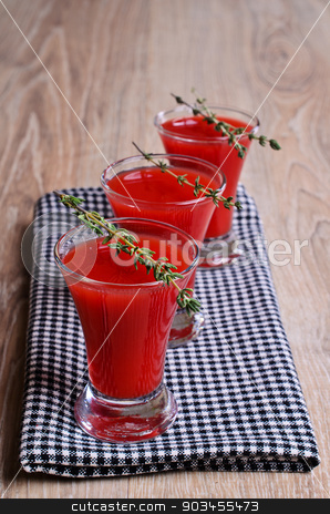 To use this stock image in your creative project, please select the size you need over to the right and click the "Add to Cart" button.
Your downloaded image will come with the Cutcaster watermark removed so don’t worry about the watermark you see on this page. Cocktail red stock photo, Cocktail red wine glasses standing on a napkin, with branches by zia_shusha
