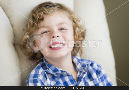 To use this stock image in your creative project, please select the size you need over to the right and click the "Add to Cart" button.
Your downloaded image will come with the Cutcaster watermark removed so don’t worry about the watermark you see on this page. Cute Blonde Boy Smiling Sitting in Chair stock photo, Cute Blonde Boy Smiling for Portrait Sitting in Chair. by Andy Dean
