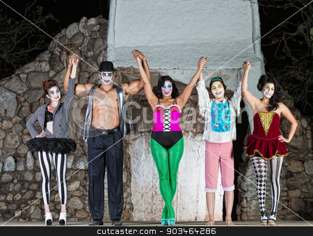 To use this stock image in your creative project, please select the size you need over to the right and click the "Add to Cart" button.
Your downloaded image will come with the Cutcaster watermark removed so don’t worry about the watermark you see on this page. Happy Cirque Clowns on Stage stock photo, Group of happy cirque clowns holding hands by Scott Griessel