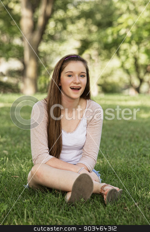 To use this stock image in your creative project, please select the size you need over to the right and click the "Add to Cart" button.
Your downloaded image will come with the Cutcaster watermark removed so don’t worry about the watermark you see on this page. Laughing Teen Girl stock photo, Laughing teen girl with braces sitting outside by Scott Griessel