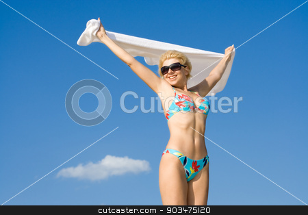 To use this stock image in your creative project, please select the size you need over to the right and click the "Add to Cart" button.
Your downloaded image will come with the Cutcaster watermark removed so don’t worry about the watermark you see on this page. flight stock photo, happy girl relaxing on the beach by Syda Productions