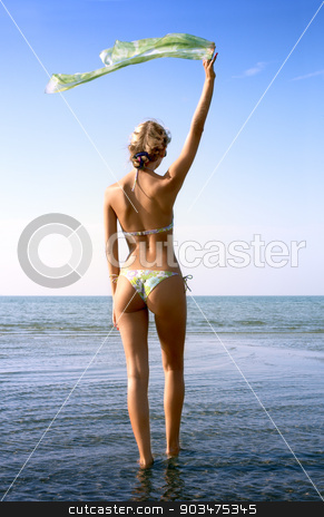 To use this stock image in your creative project, please select the size you need over to the right and click the "Add to Cart" button.
Your downloaded image will come with the Cutcaster watermark removed so don’t worry about the watermark you see on this page. blond with green scarf stock photo, pretty blond in bikini with green scarf in water by Syda Productions