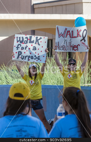 To use this stock image in your creative project, please select the size you need over to the right and click the "Add to Cart" button.
Your downloaded image will come with the Cutcaster watermark removed so don’t worry about the watermark you see on this page. Young Women Encouraging AIDSwalk Participants stock photo, TUCSON, AZ/USA - OCTOBER 12: Unidentified young women encouraging AIDSwalk participants on October 12, 2014 in Tucson, Arizona, USA. by Scott Griessel