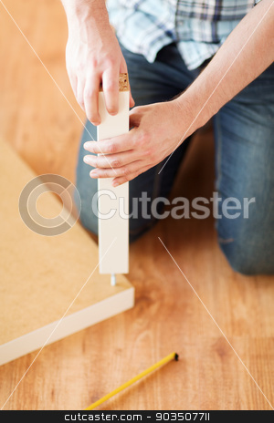 To use this stock image in your creative project, please select the size you need over to the right and click the "Add to Cart" button.
Your downloaded image will come with the Cutcaster watermark removed so don’t worry about the watermark you see on this page. close up of male hands assemblying legs to table stock photo, furniture, home and moving concept - close up of male hands assemblying legs to table by Syda Productions