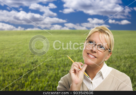 To use this stock image in your creative project, please select the size you need over to the right and click the "Add to Cart" button.
Your downloaded image will come with the Cutcaster watermark removed so don’t worry about the watermark you see on this page. Contemplative Woman in Grass Field Looking Up and Over stock photo, Contemplative Woman in Grass Field Looking Up and Over to the Side. by Andy Dean