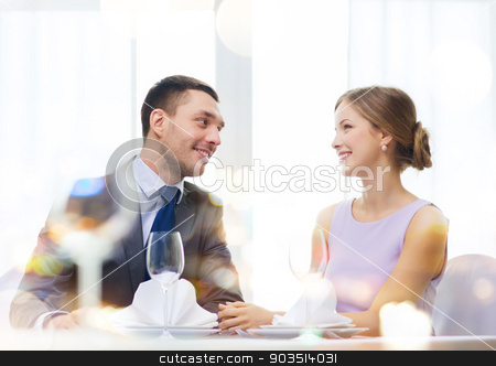 To use this stock image in your creative project, please select the size you need over to the right and click the "Add to Cart" button.
Your downloaded image will come with the Cutcaster watermark removed so don’t worry about the watermark you see on this page. smiling couple looking at each other at restaurant stock photo, restaurant, couple and holiday concept - smiling couple looking at each other at restaurant by Syda Productions