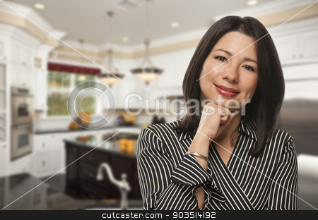 To use this stock image in your creative project, please select the size you need over to the right and click the "Add to Cart" button.
Your downloaded image will come with the Cutcaster watermark removed so don’t worry about the watermark you see on this page. Hispanic Woman Standing in Beautiful Custom Kitchen stock photo, Attractive Hispanic Woman Standing in Beautiful Custom Kitchen. by Andy Dean