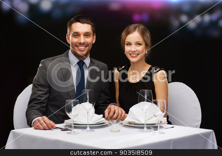 To use this stock image in your creative project, please select the size you need over to the right and click the "Add to Cart" button.
Your downloaded image will come with the Cutcaster watermark removed so don’t worry about the watermark you see on this page. smiling couple holding hands at restaurant stock photo, restaurant, couple and holiday concept - smiling couple holding hands at restaurant by Syda Productions