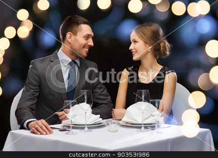 To use this stock image in your creative project, please select the size you need over to the right and click the "Add to Cart" button.
Your downloaded image will come with the Cutcaster watermark removed so don’t worry about the watermark you see on this page. smiling couple looking at each other at restaurant stock photo, restaurant, couple and holiday concept - smiling couple looking at each other at restaurant by Syda Productions