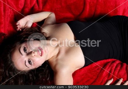 To use this stock image in your creative project, please select the size you need over to the right and click the "Add to Cart" button.
Your downloaded image will come with the Cutcaster watermark removed so don’t worry about the watermark you see on this page. Sexy Woman stock photo, Portrait of a brunette woman on red. by Henrik Lehnerer