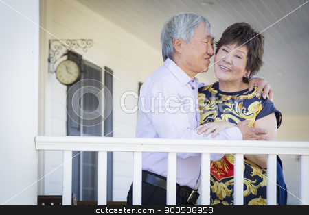To use this stock image in your creative project, please select the size you need over to the right and click the "Add to Cart" button.
Your downloaded image will come with the Cutcaster watermark removed so don’t worry about the watermark you see on this page. Attractive Chinese Couple Enjoying Their House stock photo, Attractive Happy Chinese Couple Enjoying Their House Outside. by Andy Dean