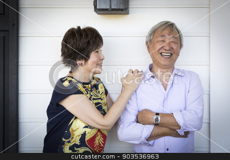 To use this stock image in your creative project, please select the size you need over to the right and click the "Add to Cart" button.
Your downloaded image will come with the Cutcaster watermark removed so don’t worry about the watermark you see on this page. Attractive Chinese Couple Enjoying Their House stock photo, Attractive Happy Chinese Couple Enjoying Their House Outside. by Andy Dean