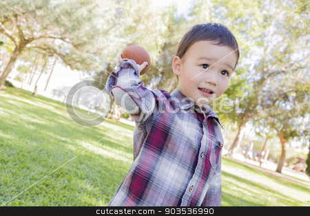 To use this stock image in your creative project, please select the size you need over to the right and click the "Add to Cart" button.
Your downloaded image will come with the Cutcaster watermark removed so don’t worry about the watermark you see on this page. Mixed Race Boy Playing Football Outside stock photo, Adorable Mixed Race Boy Playing Football Outside at the Park. by Andy Dean