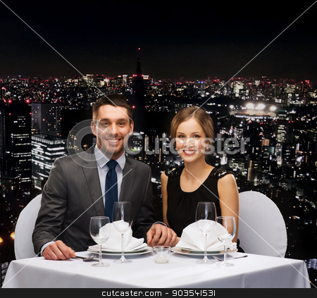 To use this stock image in your creative project, please select the size you need over to the right and click the "Add to Cart" button.
Your downloaded image will come with the Cutcaster watermark removed so don’t worry about the watermark you see on this page. smiling couple holding hands at restaurant stock photo, restaurant, couple and holiday concept - smiling couple holding hands at restaurant by Syda Productions