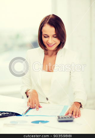 To use this stock image in your creative project, please select the size you need over to the right and click the "Add to Cart" button.
Your downloaded image will come with the Cutcaster watermark removed so don’t worry about the watermark you see on this page. businesswoman working with calculator in office stock photo, business concept - businesswoman working with calculator in office by Syda Productions
