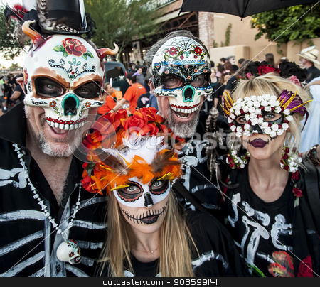 To use this stock image in your creative project, please select the size you need over to the right and click the "Add to Cart" button.
Your downloaded image will come with the Cutcaster watermark removed so don’t worry about the watermark you see on this page. People in Dia De Los Muertos Masks and Makeup stock photo, TUCSON, AZ/USA - NOVEMBER 09: Four unidentified people in masks at the All Souls Procession on November 09, 2014 in Tucson, AZ, USA. by Scott Griessel