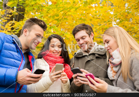 To use this stock image in your creative project, please select the size you need over to the right and click the "Add to Cart" button.
Your downloaded image will come with the Cutcaster watermark removed so don’t worry about the watermark you see on this page. smiling friends with smartphones in city park stock photo, season, people, technology and friendship concept - group of smiling friends with smartphones in autumn park by Syda Productions