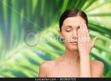 To use this stock image in your creative project, please select the size you need over to the right and click the "Add to Cart" button.
Your downloaded image will come with the Cutcaster watermark removed so don’t worry about the watermark you see on this page. smiling young woman covering face with hand stock photo, beauty, people and health concept - smiling young woman covering half of face with hand over palm tree leaves background by Syda Productions