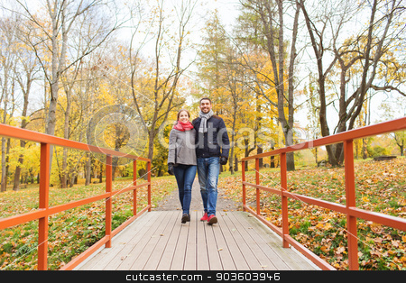 To use this stock image in your creative project, please select the size you need over to the right and click the "Add to Cart" button.
Your downloaded image will come with the Cutcaster watermark removed so don’t worry about the watermark you see on this page. smiling couple hugging on bridge in autumn park stock photo, love, relationship, family, season and people concept - smiling couple hugging on bridge in autumn park by Syda Productions