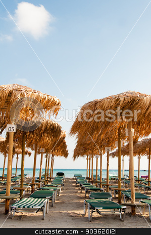 To use this stock image in your creative project, please select the size you need over to the right and click the "Add to Cart" button.
Your downloaded image will come with the Cutcaster watermark removed so don’t worry about the watermark you see on this page. Umbrellas and sunbeds on Elafonissi beach, Crete, Greece stock photo, Umbrellas and sunbeds on Elafonissi beach, Crete, Greece by Constantin Stanciu