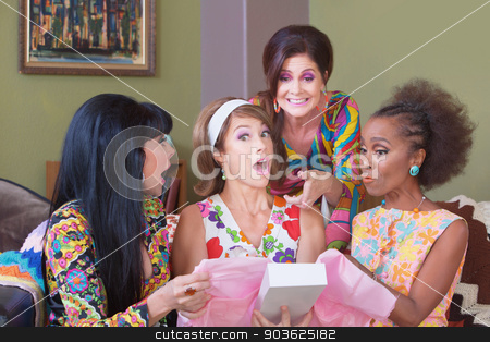 To use this stock image in your creative project, please select the size you need over to the right and click the "Add to Cart" button.
Your downloaded image will come with the Cutcaster watermark removed so don’t worry about the watermark you see on this page. Surprised Woman with Gift stock photo, Cute surprised woman holding box with friends at party by Scott Griessel