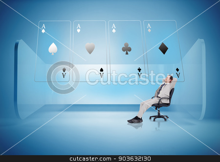 To use this stock image in your creative project, please select the size you need over to the right and click the "Add to Cart" button.
Your downloaded image will come with the Cutcaster watermark removed so don’t worry about the watermark you see on this page. Businessman on swivel chair looking at holographic cards stock photo, Businessman on swivel chair looking at holographic cards in blue light by Wavebreak Media